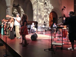 Shamou brought students up on stage to help him lead the audience in singing a few notes!