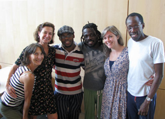 Africa Consortium partners and artists gathered at Bates in 2009 from left to right: Cathy Zimmerman (MAPP), Laura Faure (Bates), Qudus Onikeku (Nigeria), Michel Kouakou (Ivory Coast), Emily Harney (MAPP), and Opiyo Okach (Kenya)